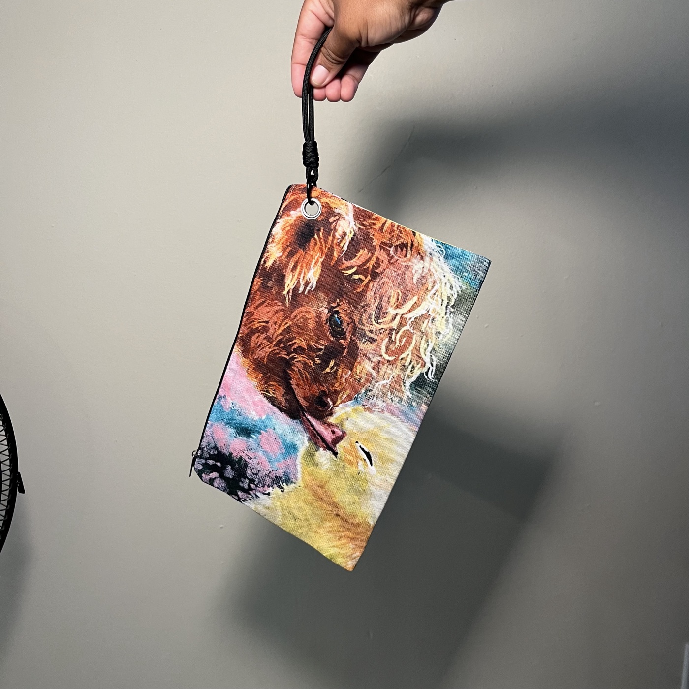 Highland Cow Kissing Ducky — Handbag / cosmetic bag, photographed by the artist